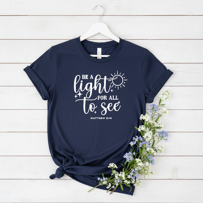 BE A LIGHT FOR ALL TO SEE - PREMIUM T-SHIRT