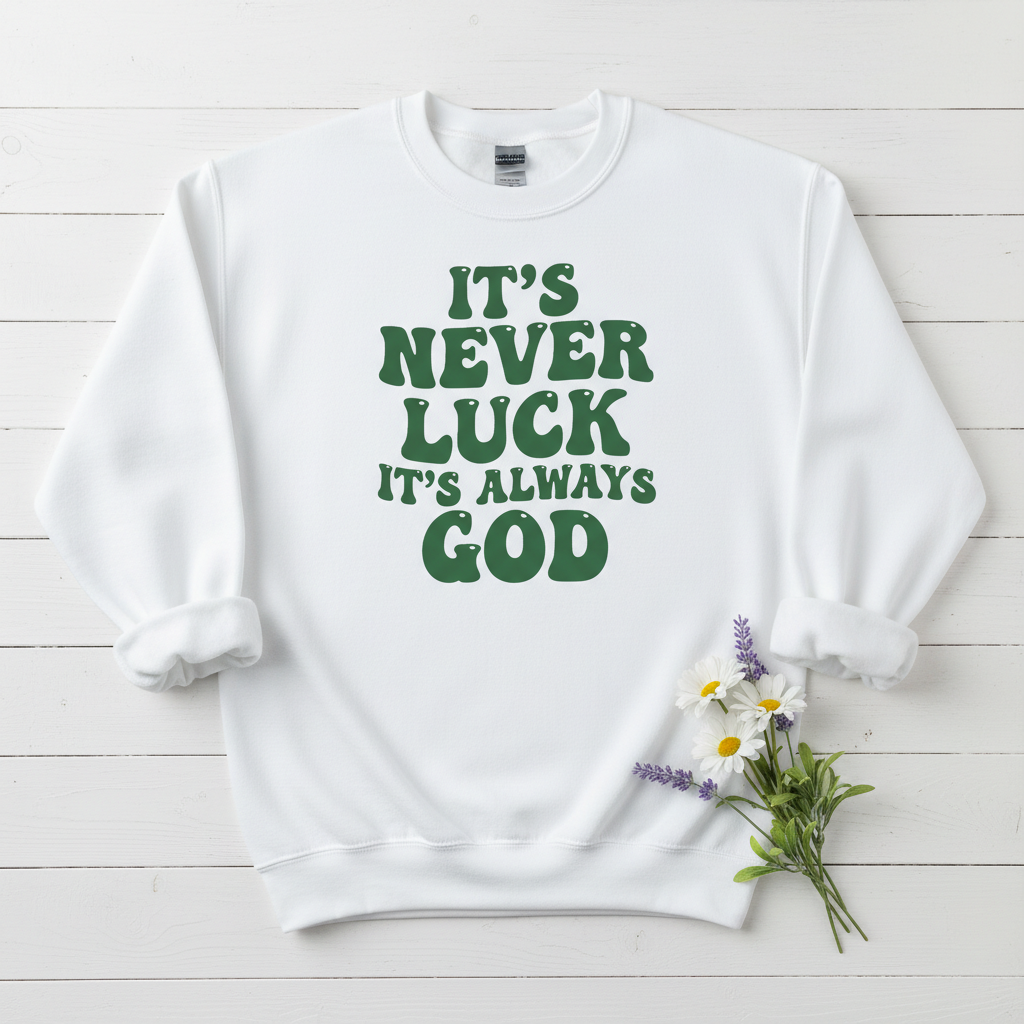 IT'S NEVER LUCK IT'S ALWAYS GOD - MEDIUM-HEAVY WEIGHT SWEATSHIRT